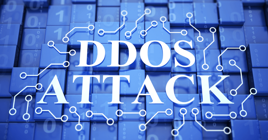 una imagen con la palabra DDOS ATTACK en grande, ciberseguridad